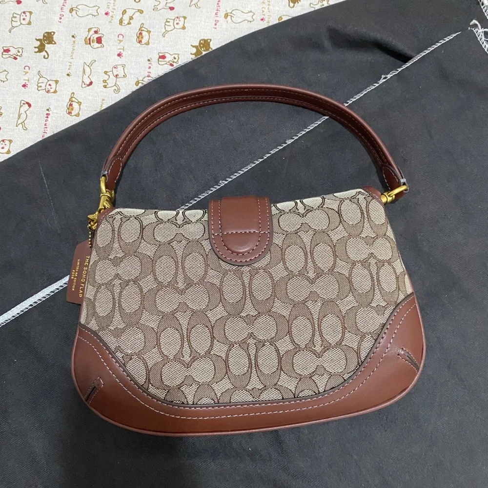 Coach Brown Signature Canvas Saddle Shoulder Bag with Gold Hardware